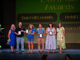 the Extra Mile Award winners are honored for their service